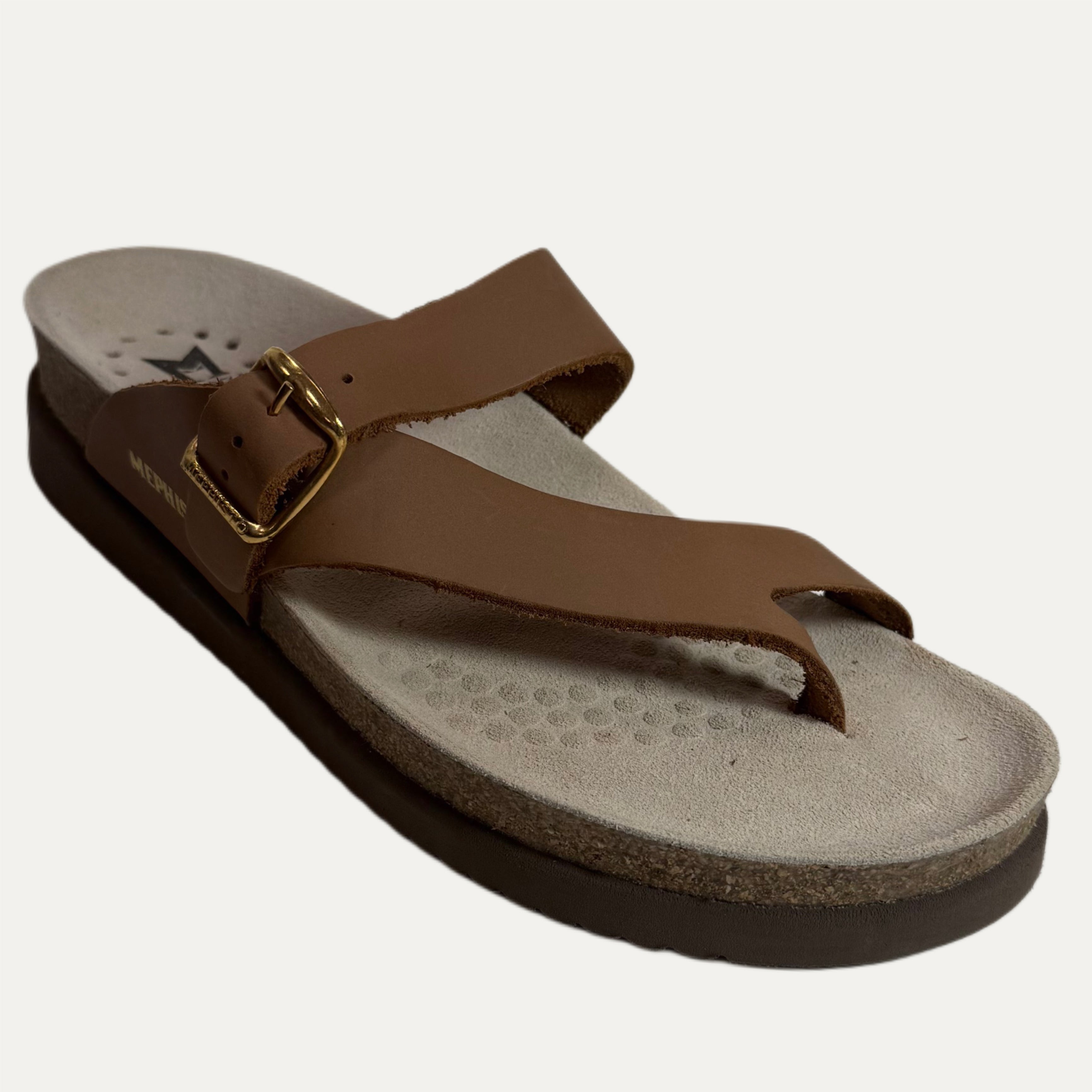 Brown sandal with a gold buckle on a white background