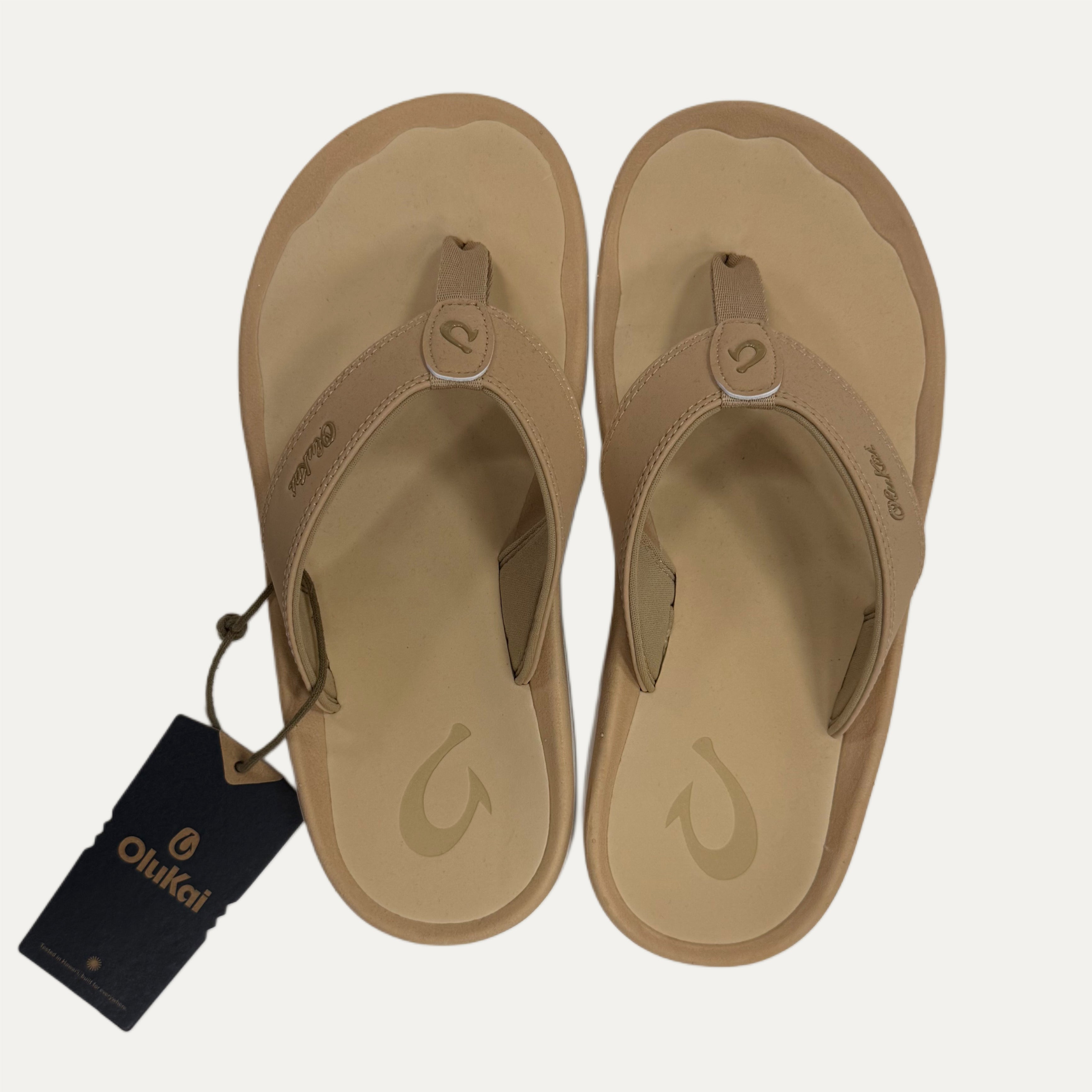 Flip Flops with a visible brand tag on a white background