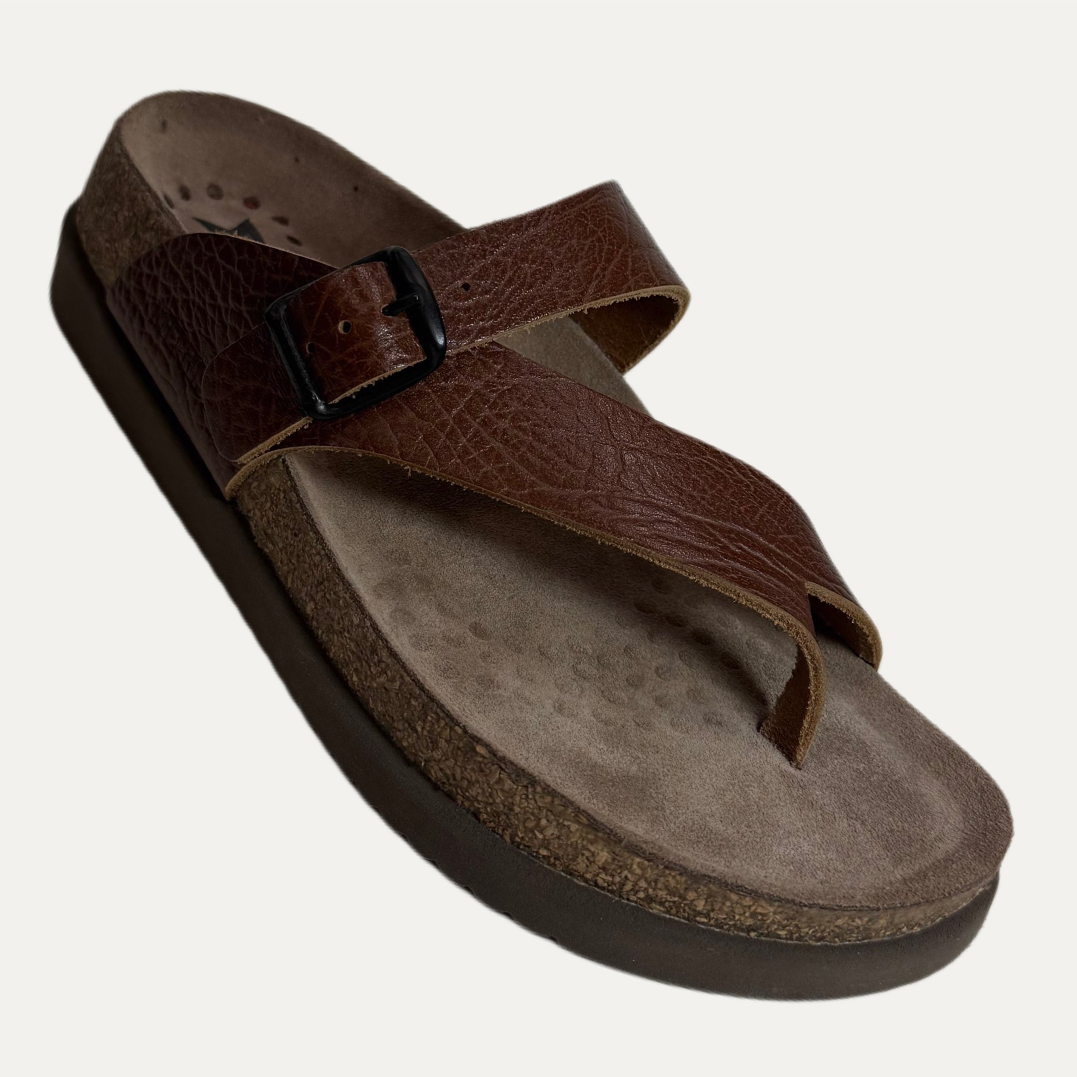 Brown sandal with a strap on a white background