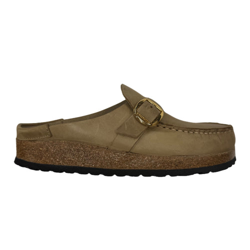 Brown clog shoe with a strap on a white background