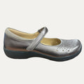 Silver shoe with a strap on a white background