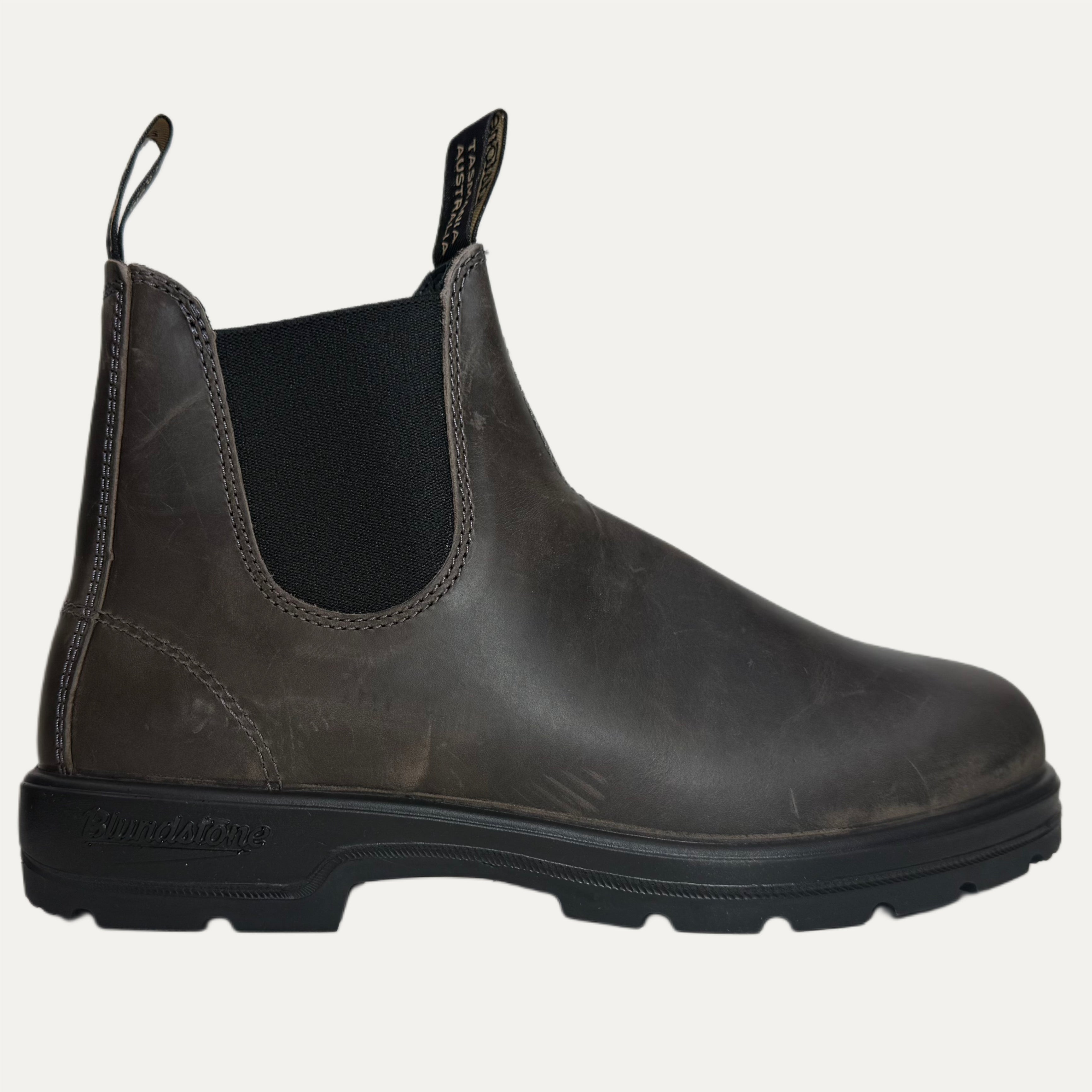 brown grey leather Chelsea boot on a white background