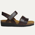 Brown sandal with a cork insole and black sole on a white background
