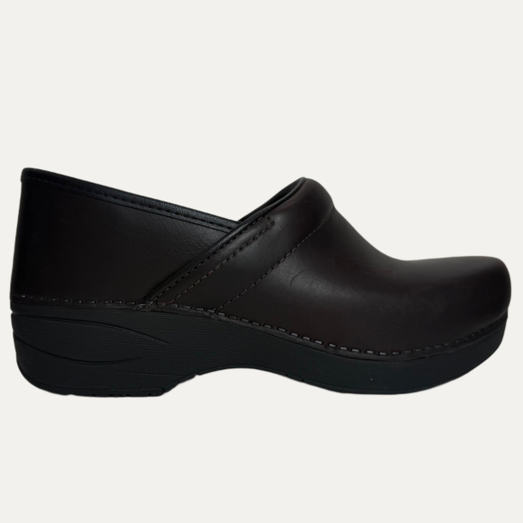Brown clog shoe on a white background