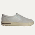 Antique white slip-on shoe on a white background