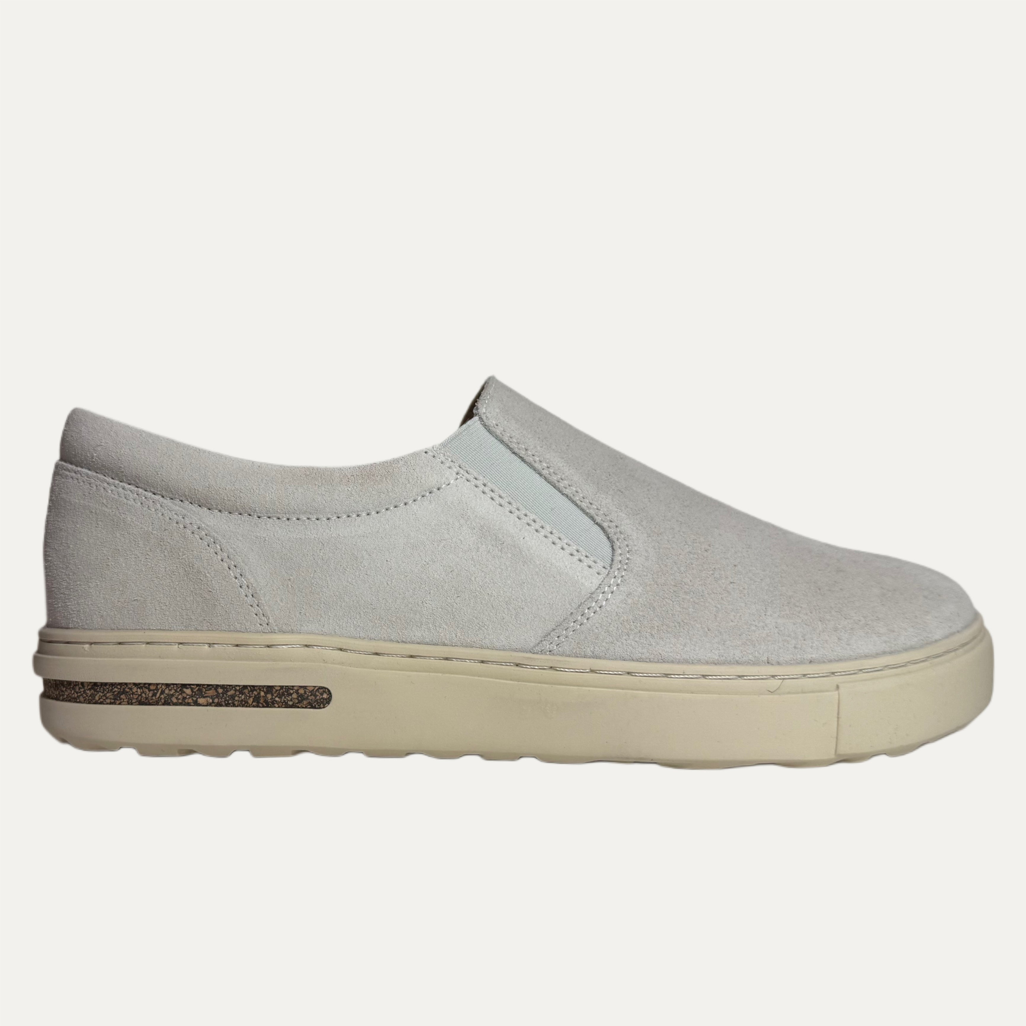 Antique white slip-on shoe on a white background