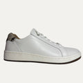 White leather sneaker with a snake patterned heel on a white background