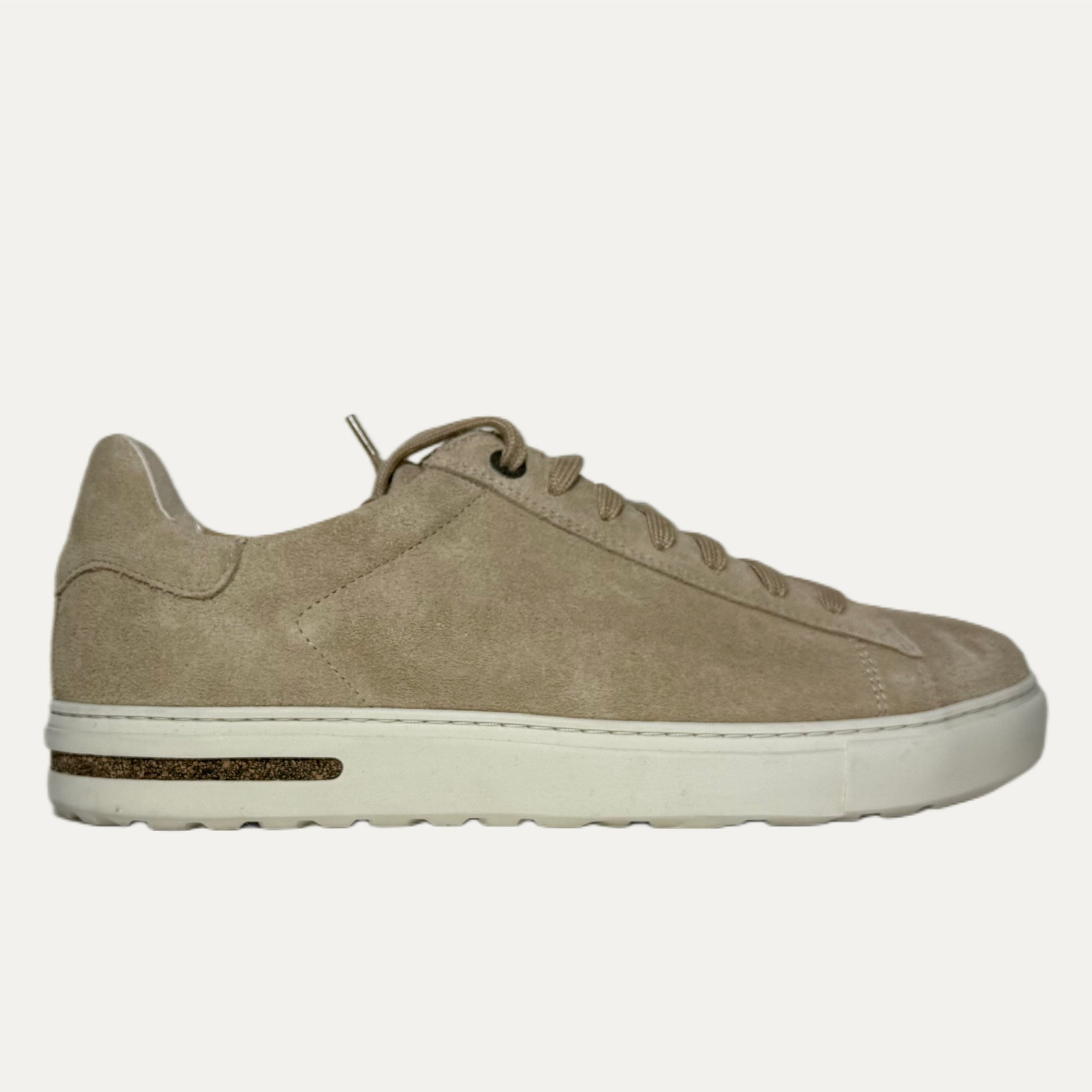 Beige sneaker on a white background