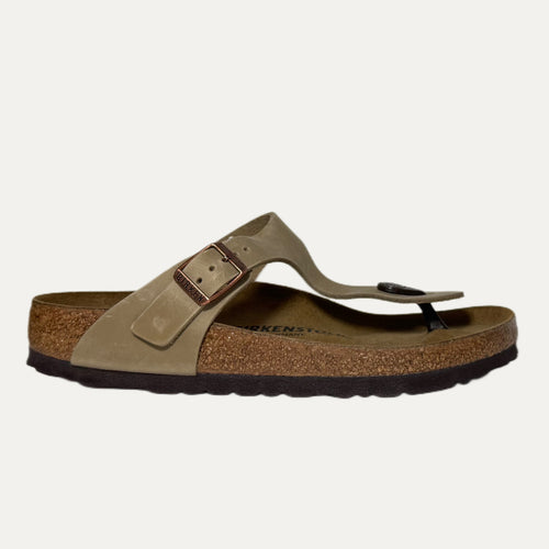 Brown sandal with cork sole on a white background