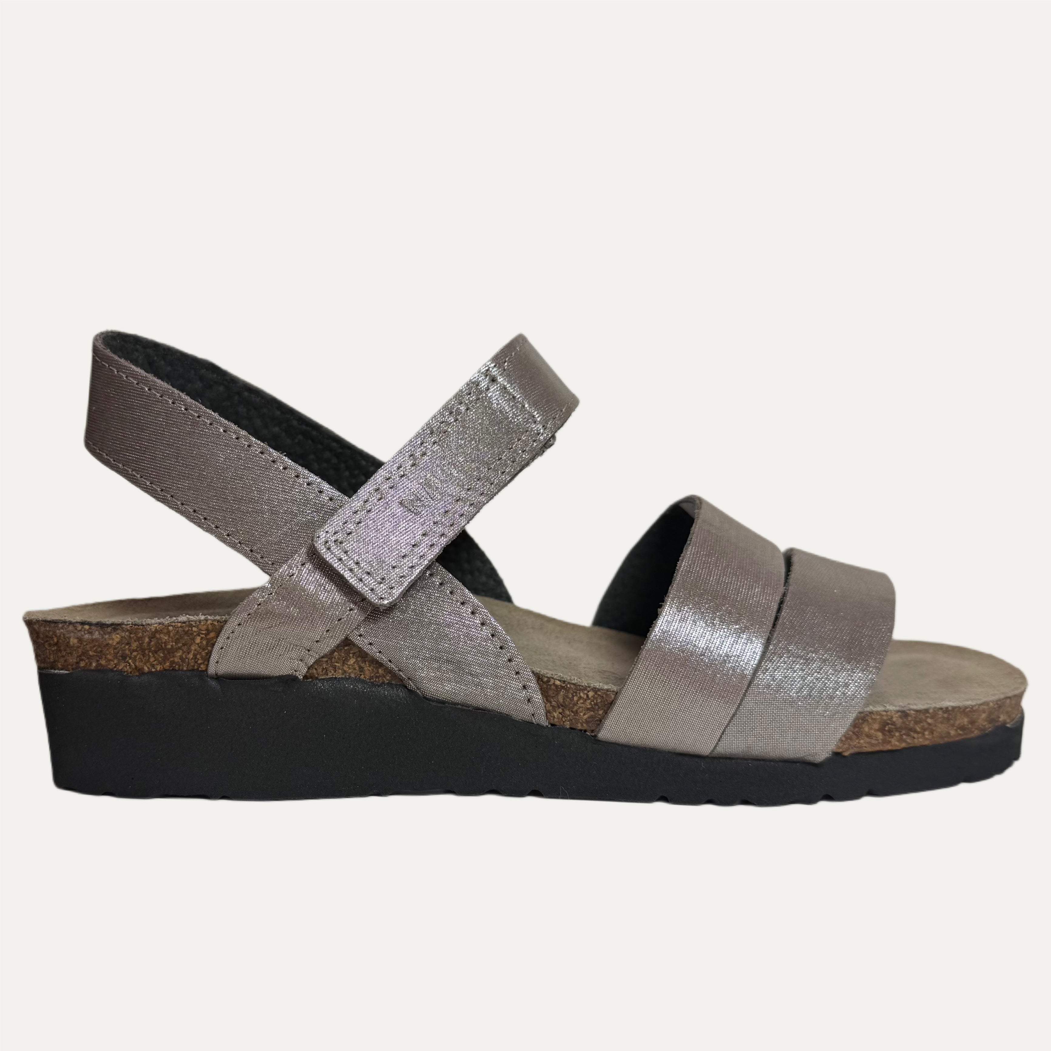 silver threaded strao sandal with cork insole and black sole on white background