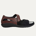 Brown and black sandal on a white backgroung