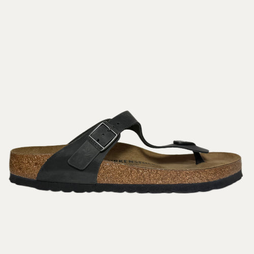 Black sandal with cork sole on a white background