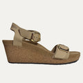 Beige wedge sandal with cork sole on a white background