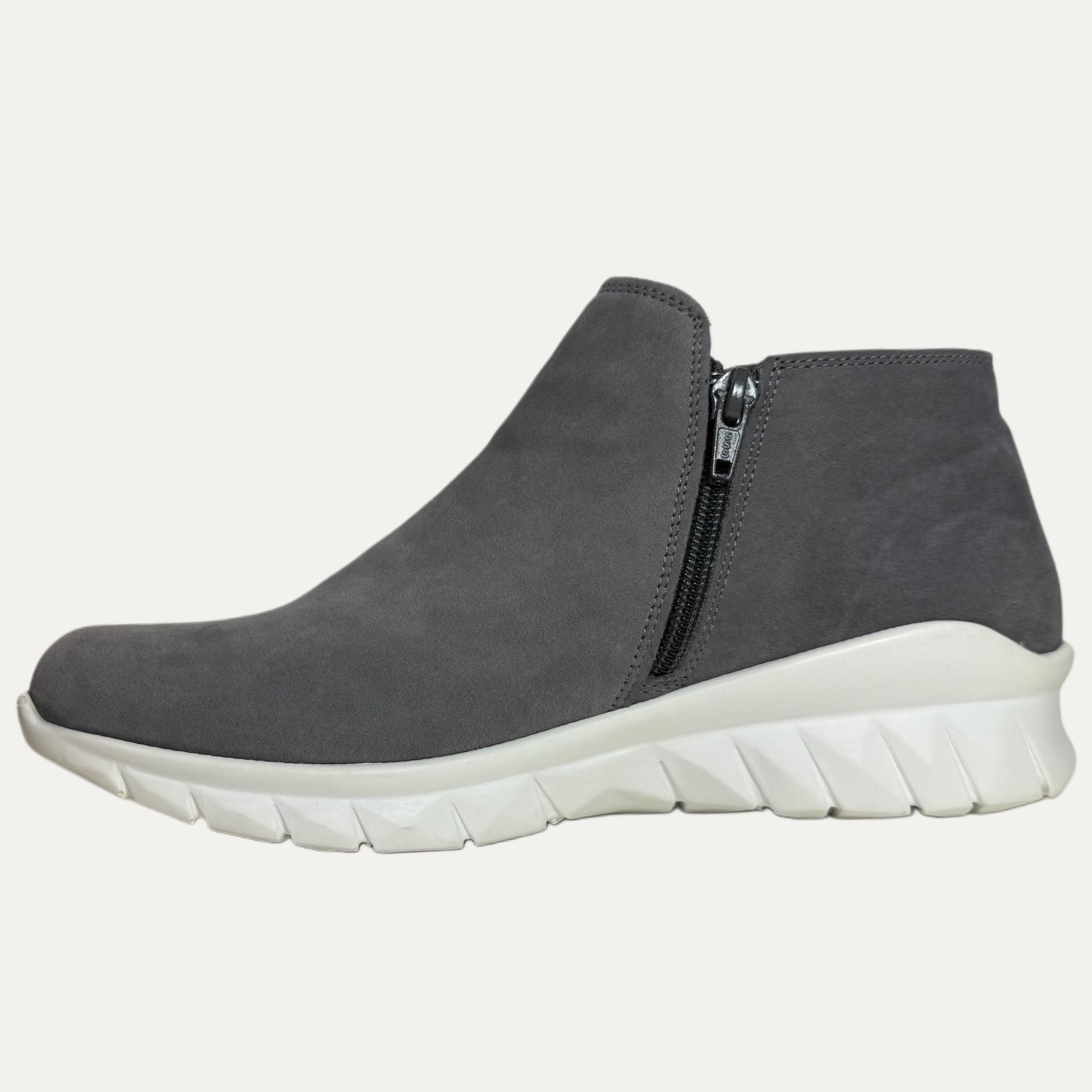 Gray ankle boot with a white sole on a white background