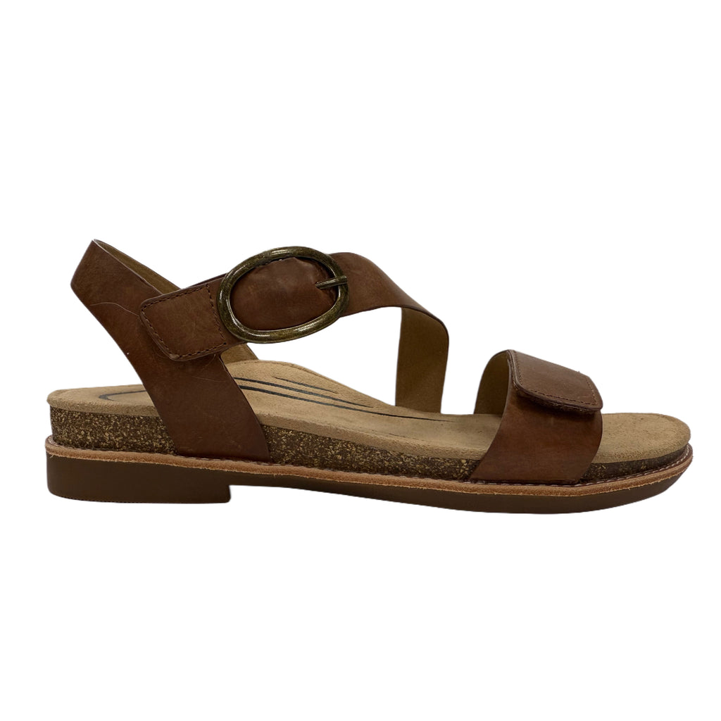 Brown sandal with a buckle on a white background