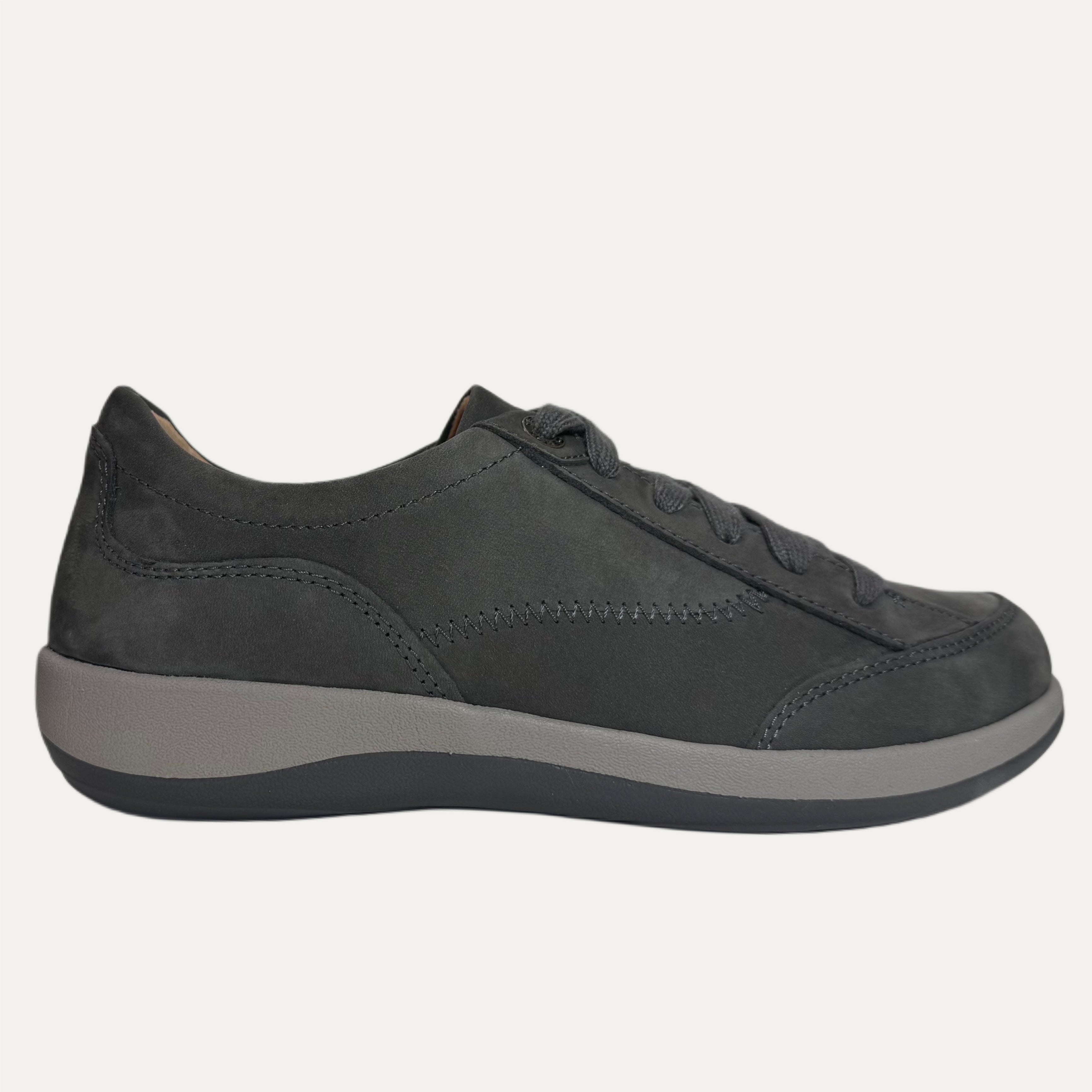 Black casual shoe on a white background