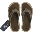 Pair of brown flip flops with a visible brand tag on a white background