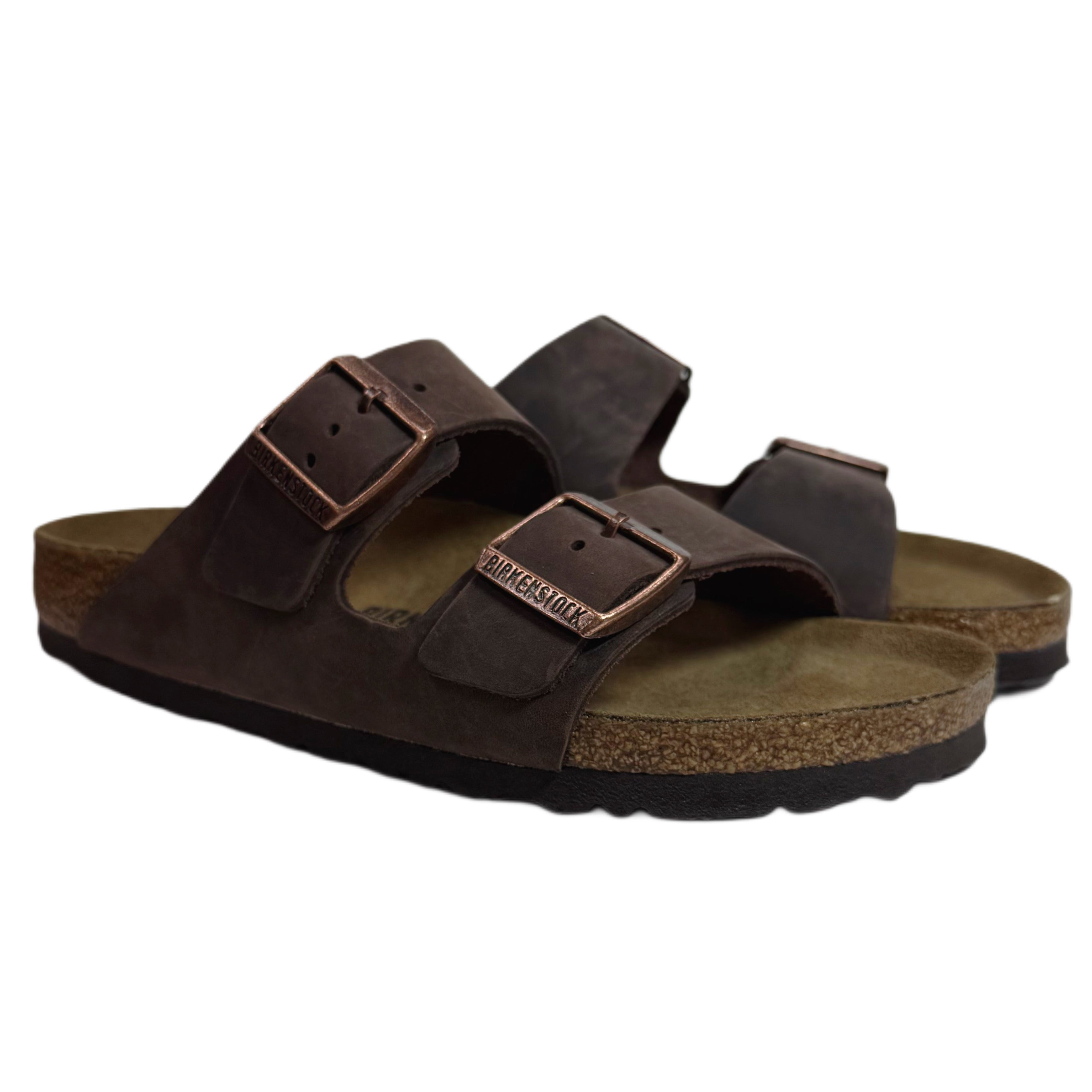 Brown sandals with cork sole on a white background