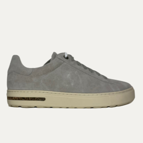 Gray suede sneaker on a white background