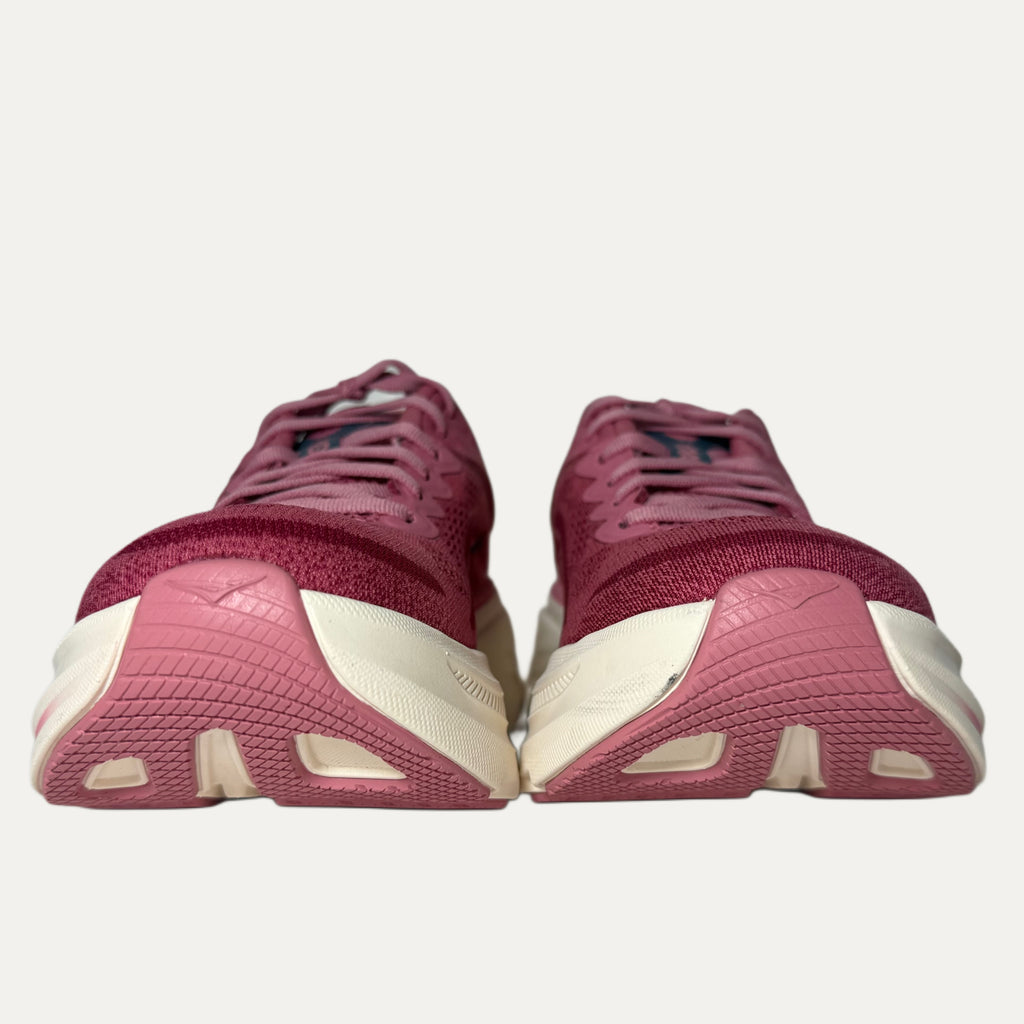 Lingonberry cranberry bondi 9 hoka running shoe on white background 