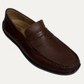 Brown leather loafer shoe on a white background