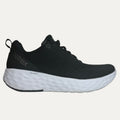 Black running shoe with white sole on a light gray background