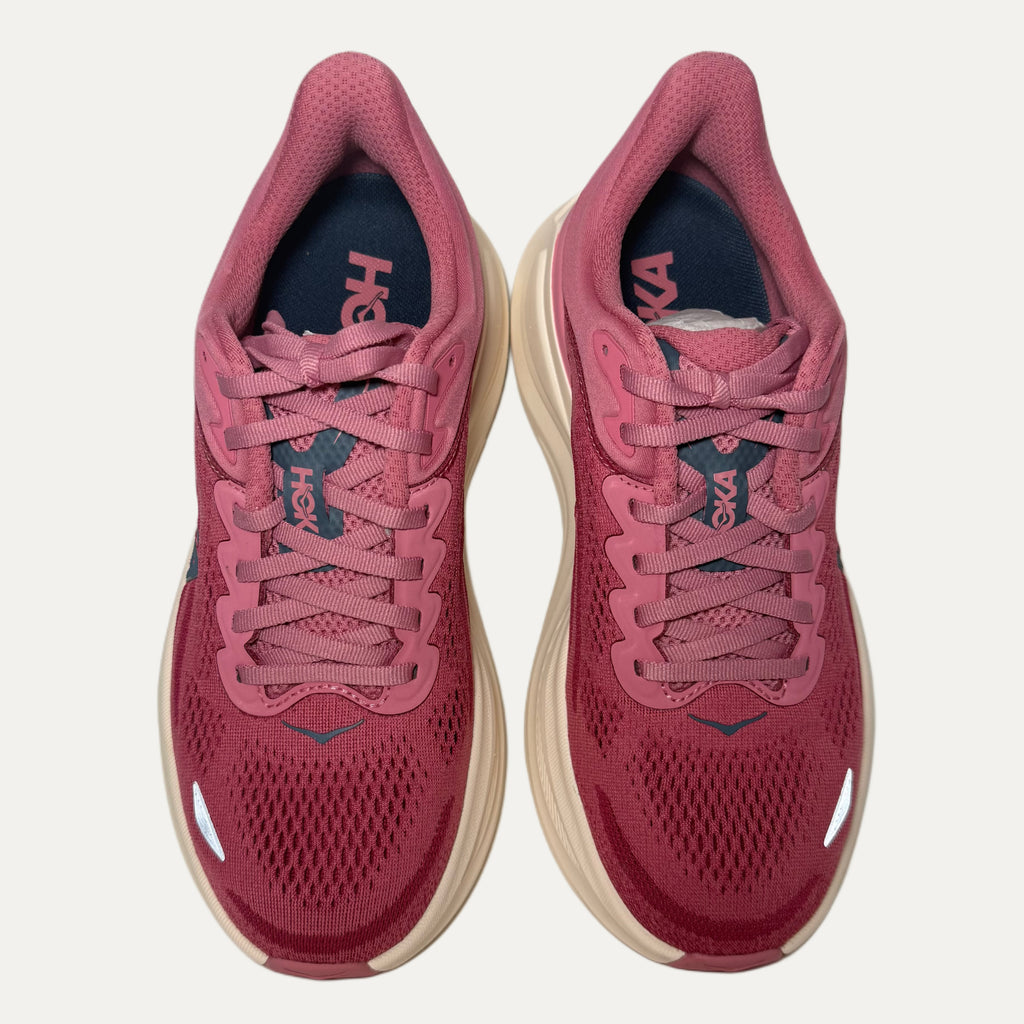 Lingonberry cranberry bondi 9 hoka running shoe on white background 