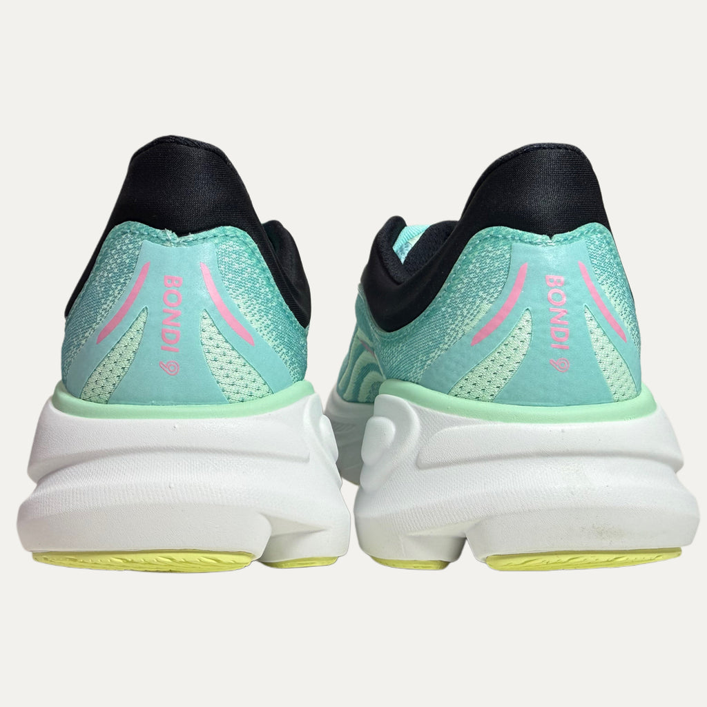 Pair of hoka bondi 9 running shoes with a pink logo and mint green and black design on a white background 