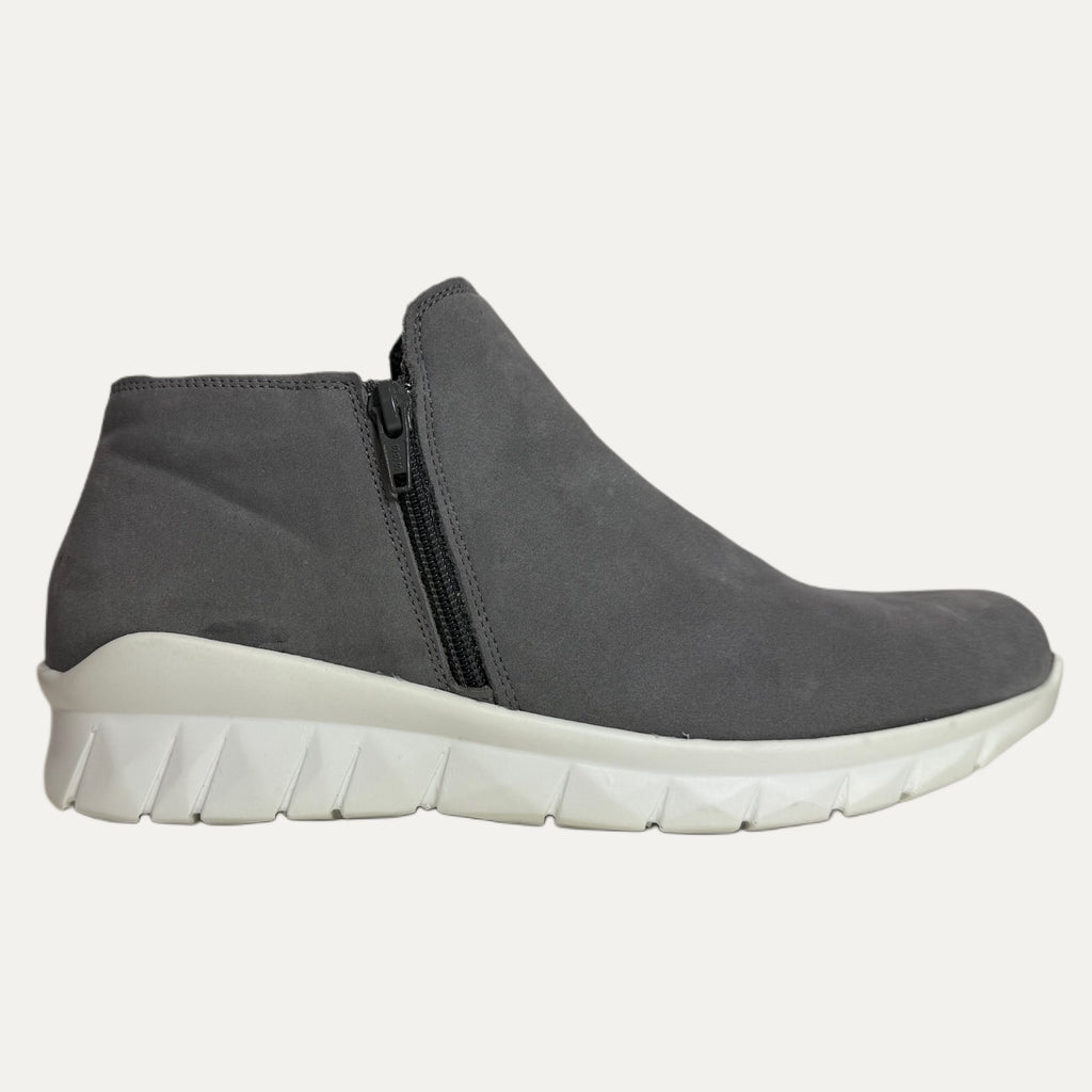 Gray ankle boot with a white sole on a white background
