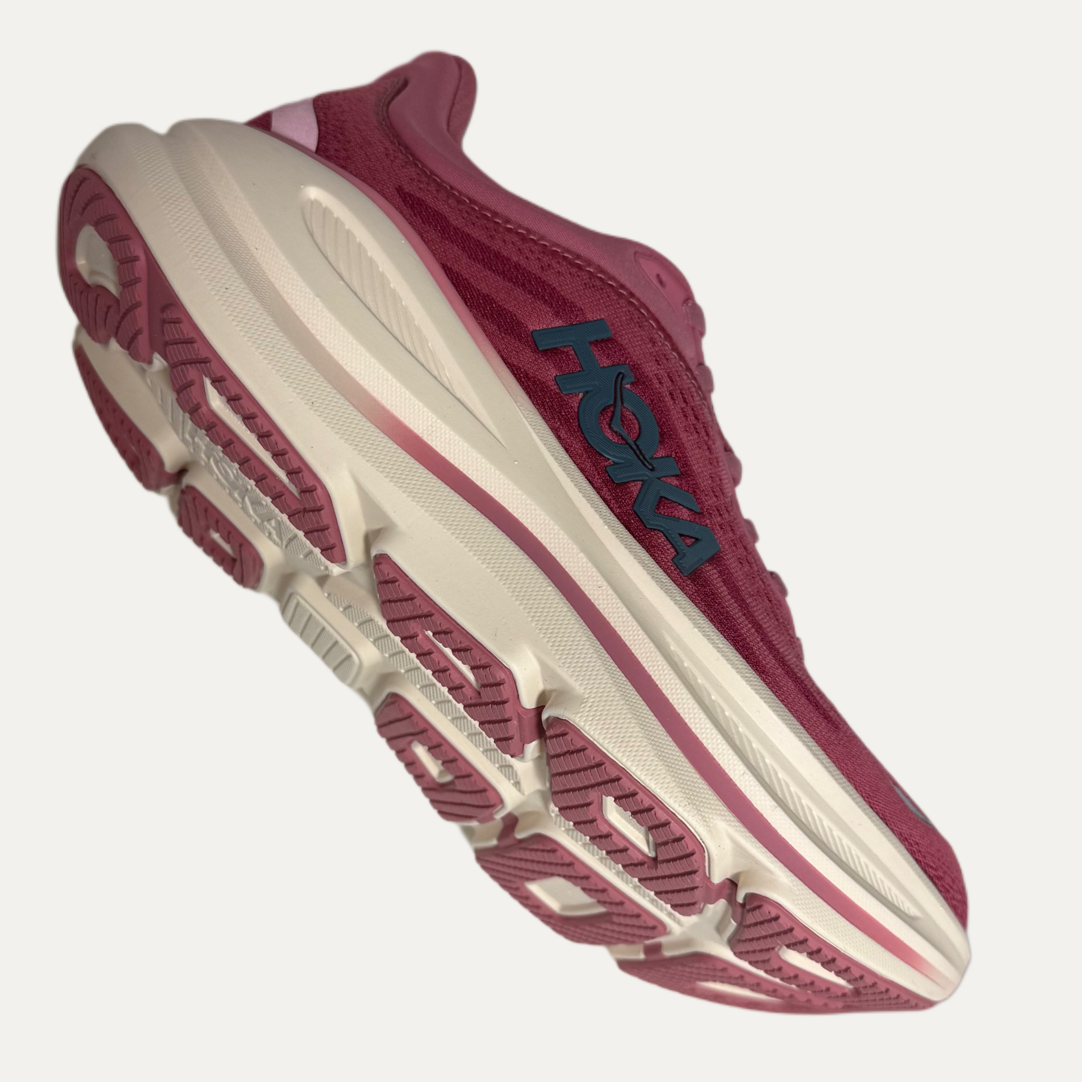 Lingonberry cranberry bondi 9 hoka running shoe on white background 