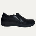 Black slip-on shoe on a white background
