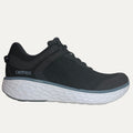 navy running shoe with white sole on a light gray background
