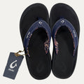A pair of Blue flip flops and a visible brand tag on a white background