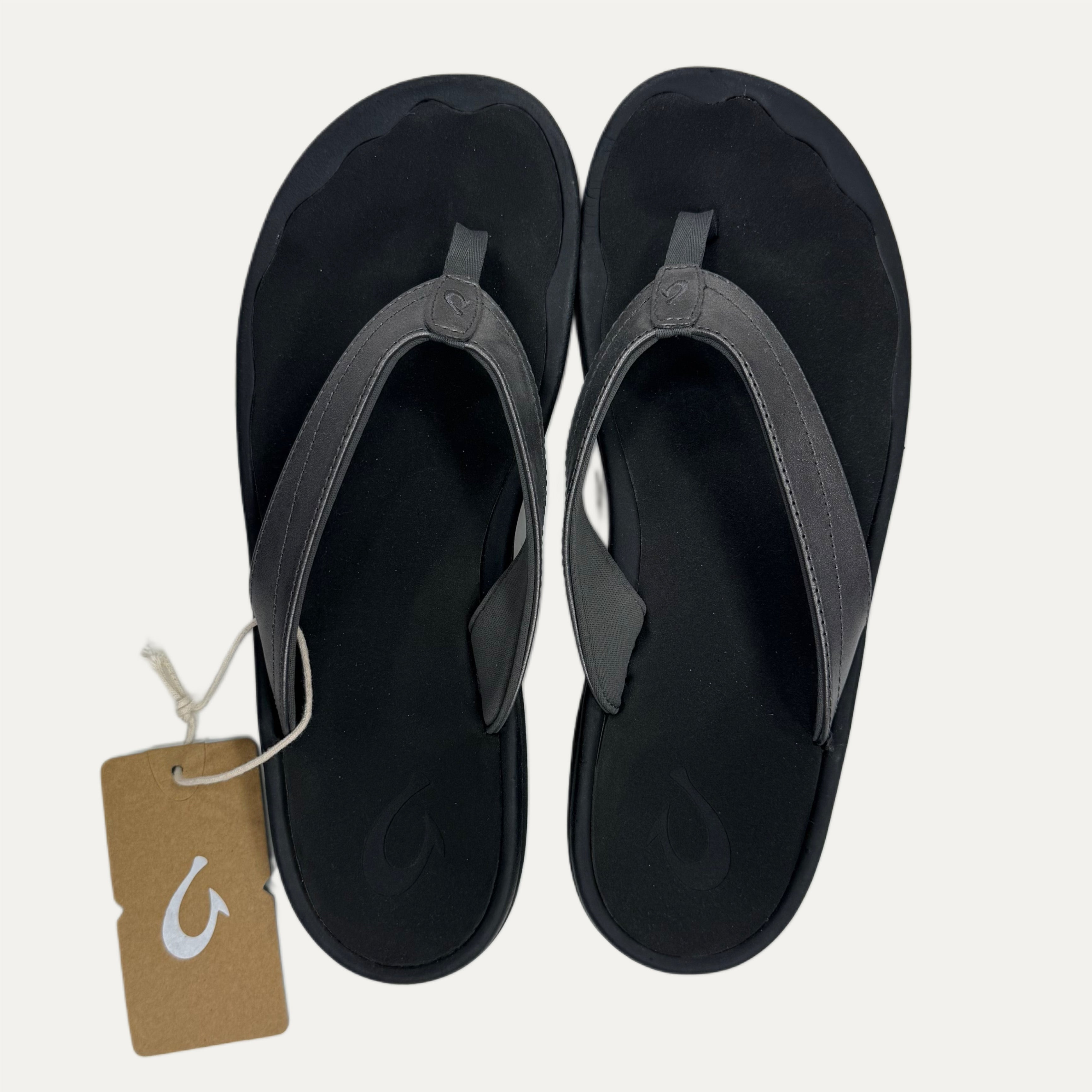 Dark gray with  flip flop a brown tag on a white background